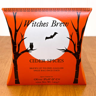 A pouch of OP's witches brew tea with a flying bat and spooky halloween trees on label