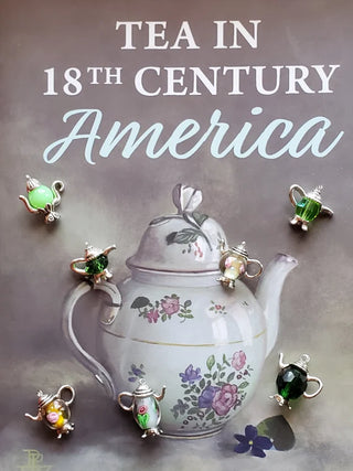 white tea pot with little charmed tea pots in a magazine ad