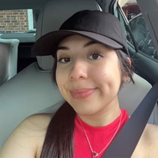 Assistant Warehouse Manager Victoria Velez in a car