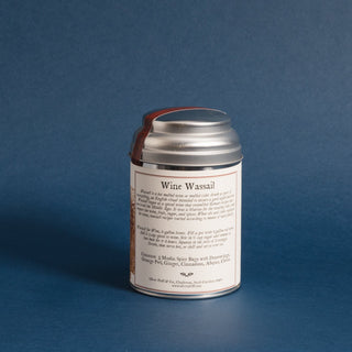 brewing instructions on small silver tea tin with blue background