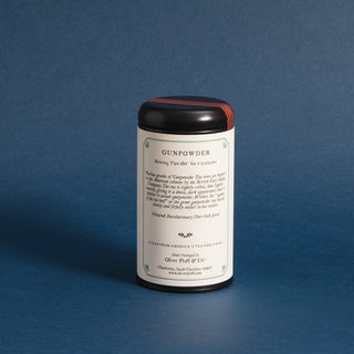 brewing instructions on backside of black tea tin with blue background