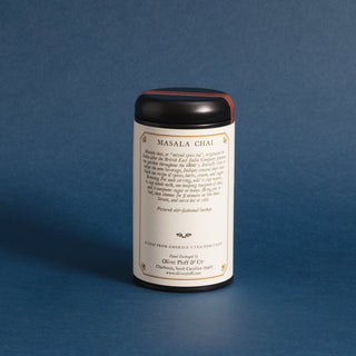 backside of black tea tin with brewing instructions against a blue background