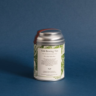 brewing instructions on small silver tea tin