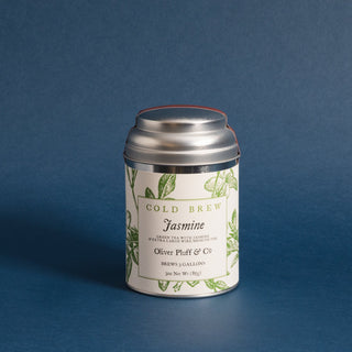 small silver tea tin with green flowery design