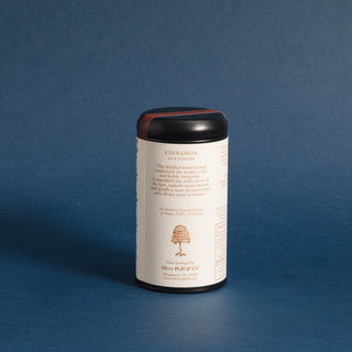 brewing instructions on black tea tin with orange pattern on label