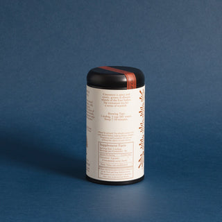 brewing instructions on black tea tin with orange pattern on label