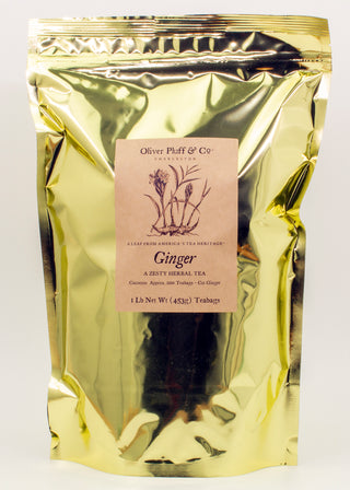 one shiny gold tea bag pouch with flower on label