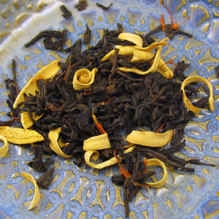 Black Tea Leaves, Orange Blossoms, Marigold Blossoms, Passionfruit Peach Flavoring