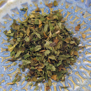 Peppermint leaves in blue bowl