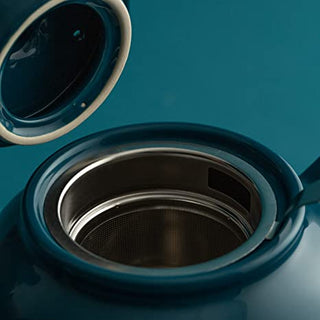 close up view of blue tea pot