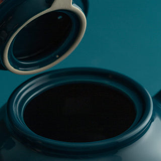 close up view of blue tea pot