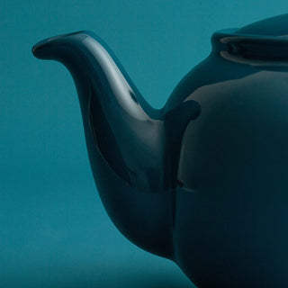 close up view of blue tea pot