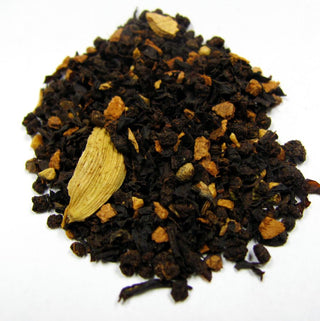 pile of yellow and dark Masala chai loose leaf tea 